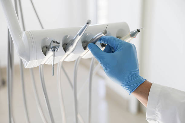 Professional Dental Implants technician working in Edmore, MI